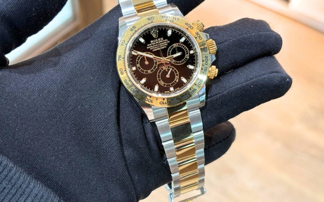 Pre loved Rolex Cosmograph Daytona 116503 two tone half gold black dial
